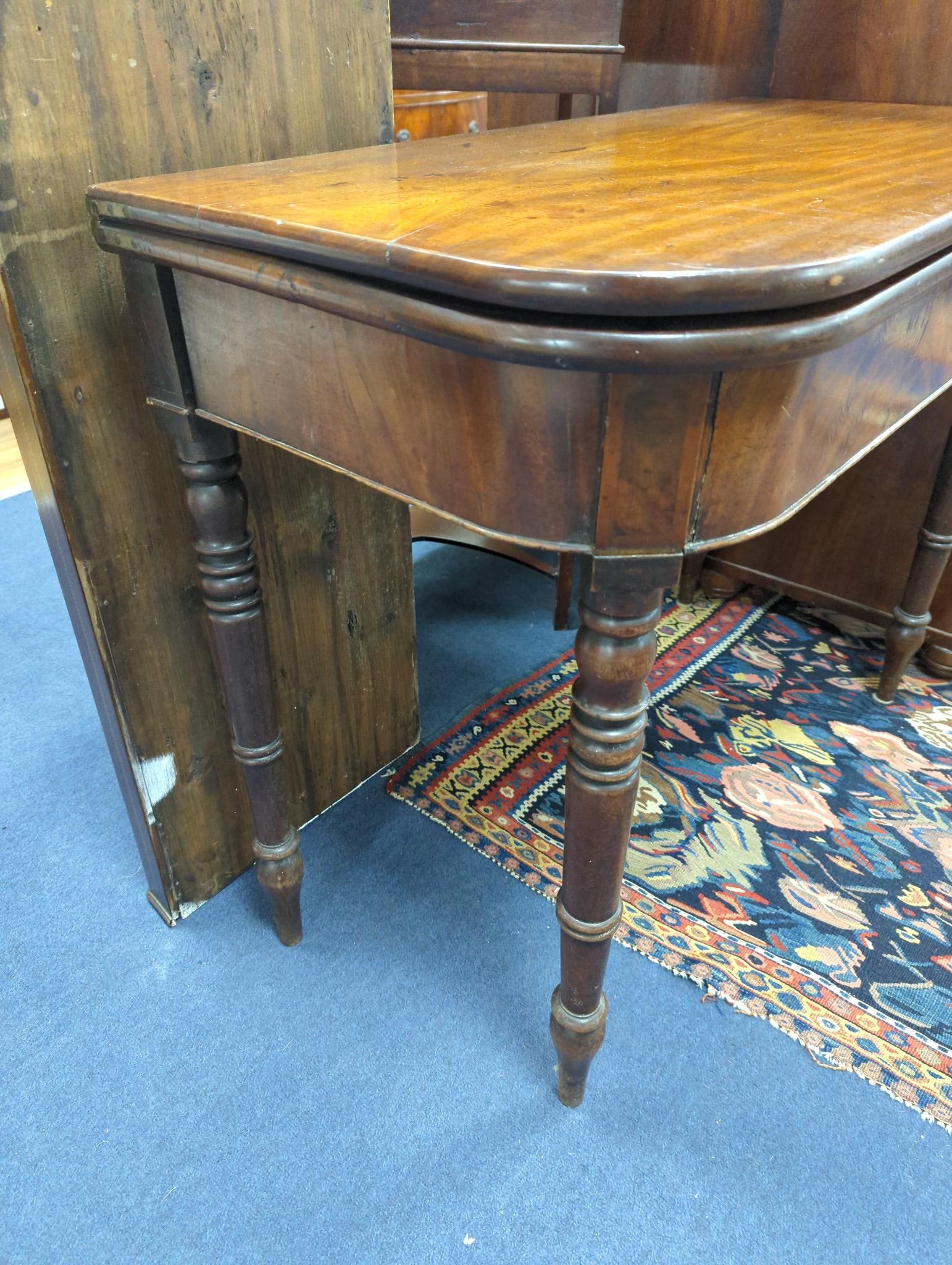A Regency mahogany D shaped folding tea table, width 91cm, depth 46cm, height 74cm